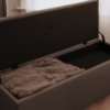 The Collector, open with blanket
